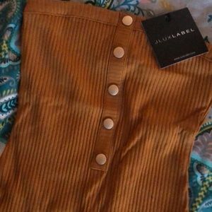 JLux label brownish/mustard body suit